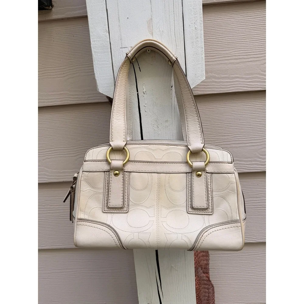 Coach legacy turnlock
